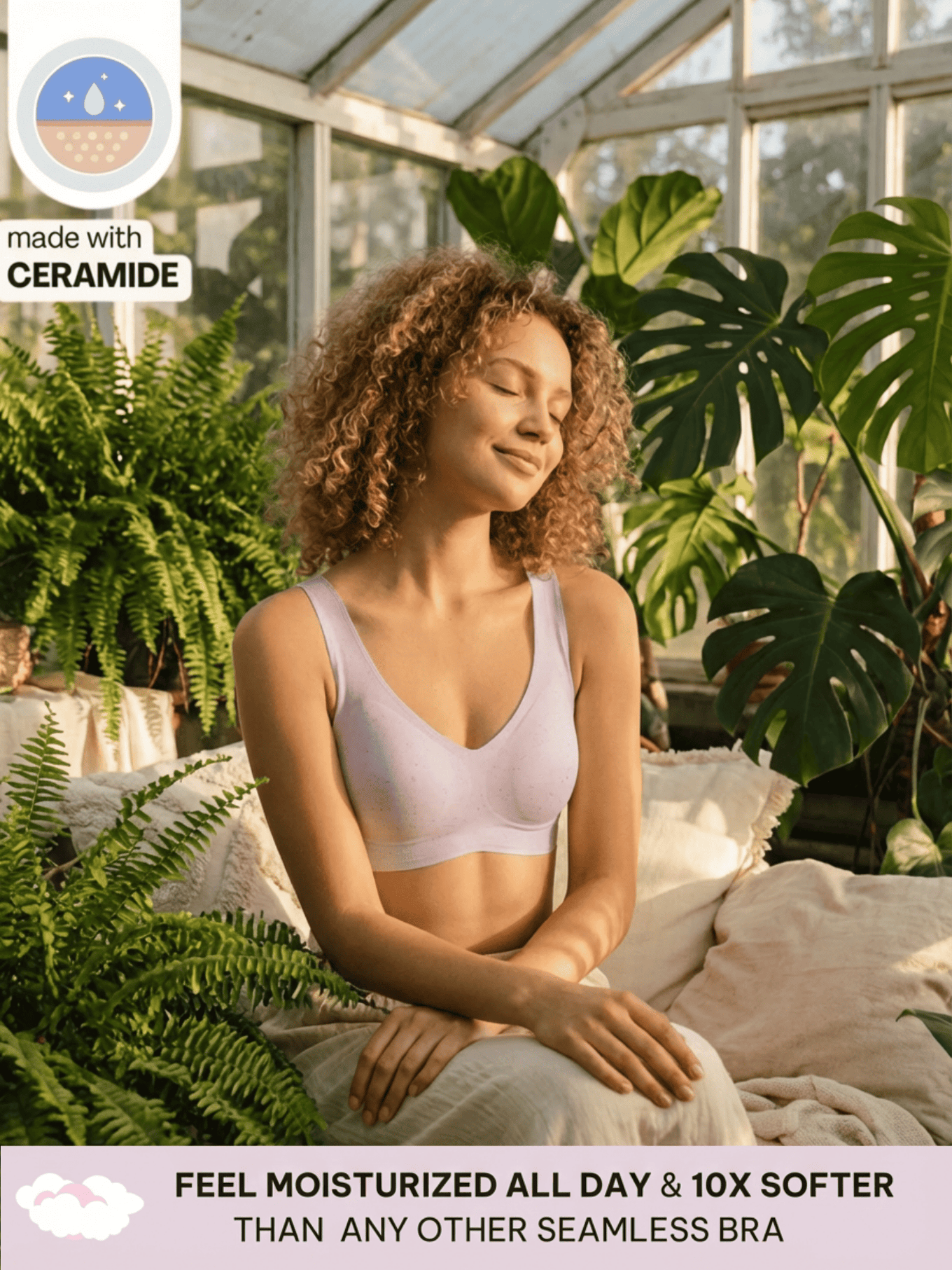 Woman sitting in a greenhouse wearing a pale lilac ceramide infused comfort bra, surrounded by plants.