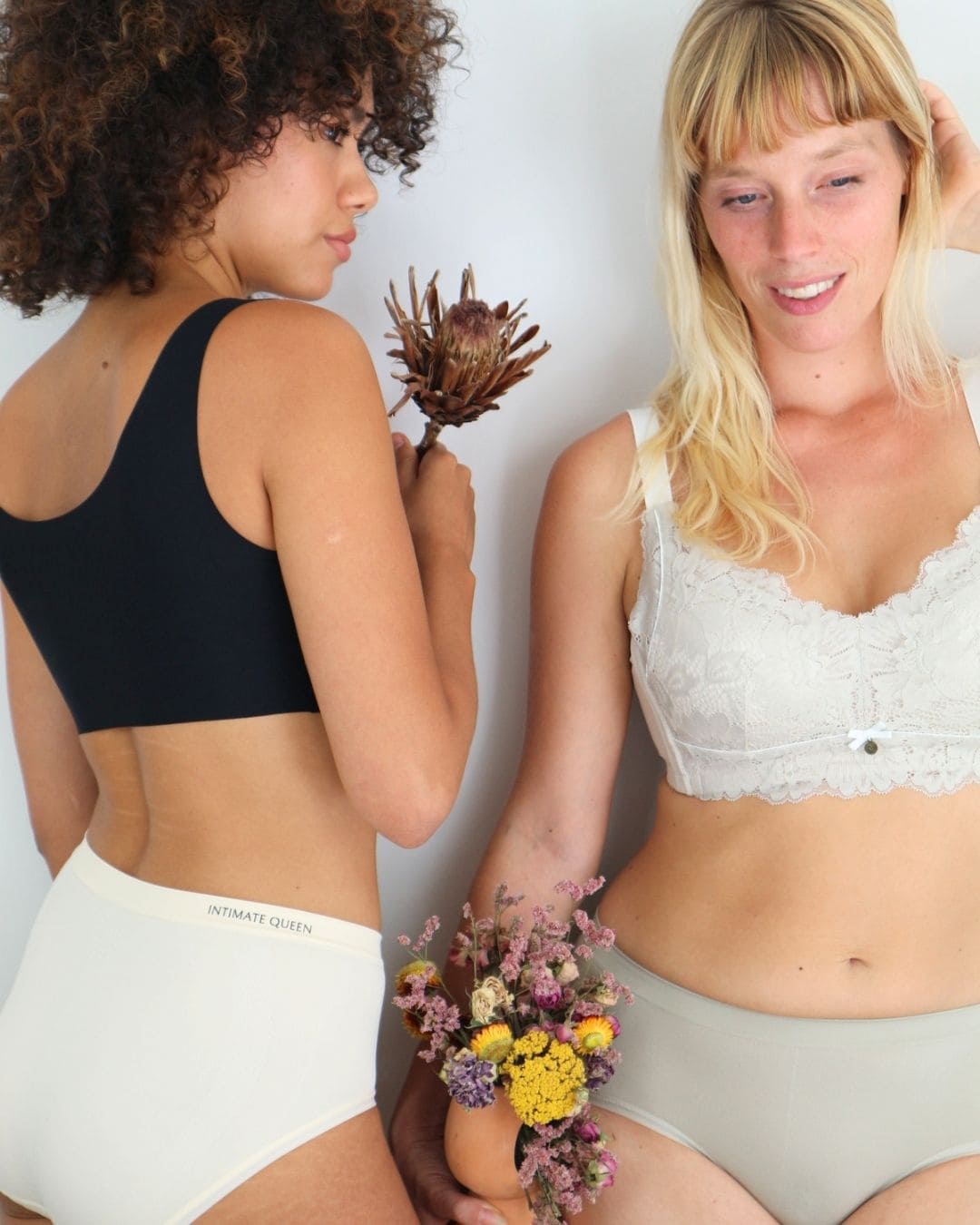 Two women wearing beige and dull green colour corn bae hipster underwear with a neutral background