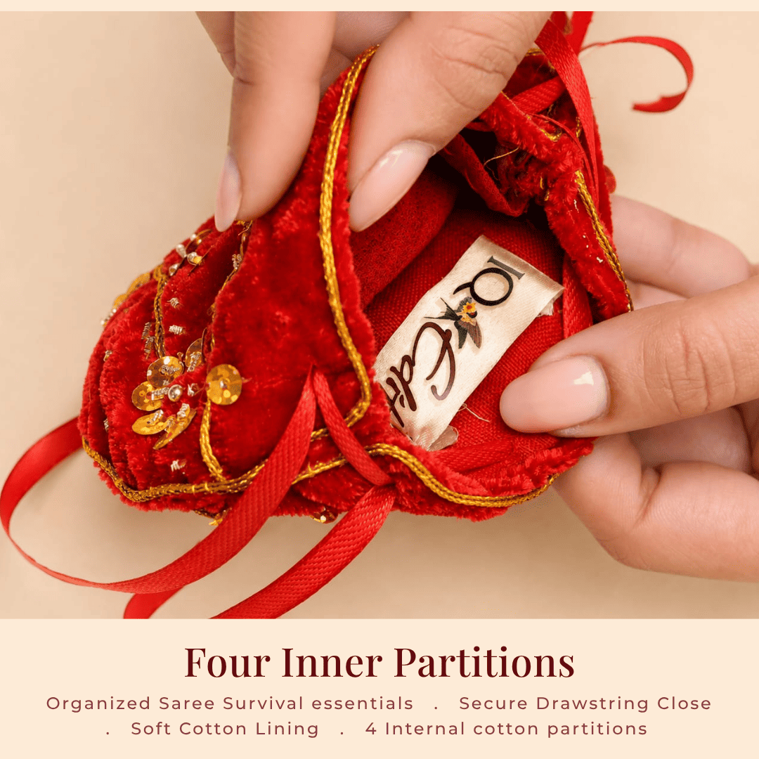 Handcrafted velvet batua with four internal cotton partitions for organising saree emergency essentials