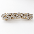 Gold-tone crystal statement barrette with clear pear-shaped and round rhinestones arranged in a sparkling cluster.