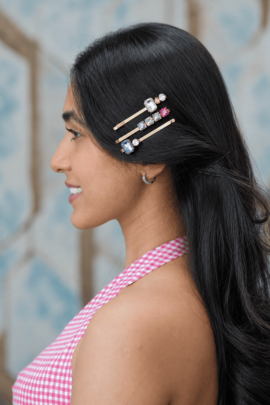 Multicolour crystal hair pins styled in dark hair