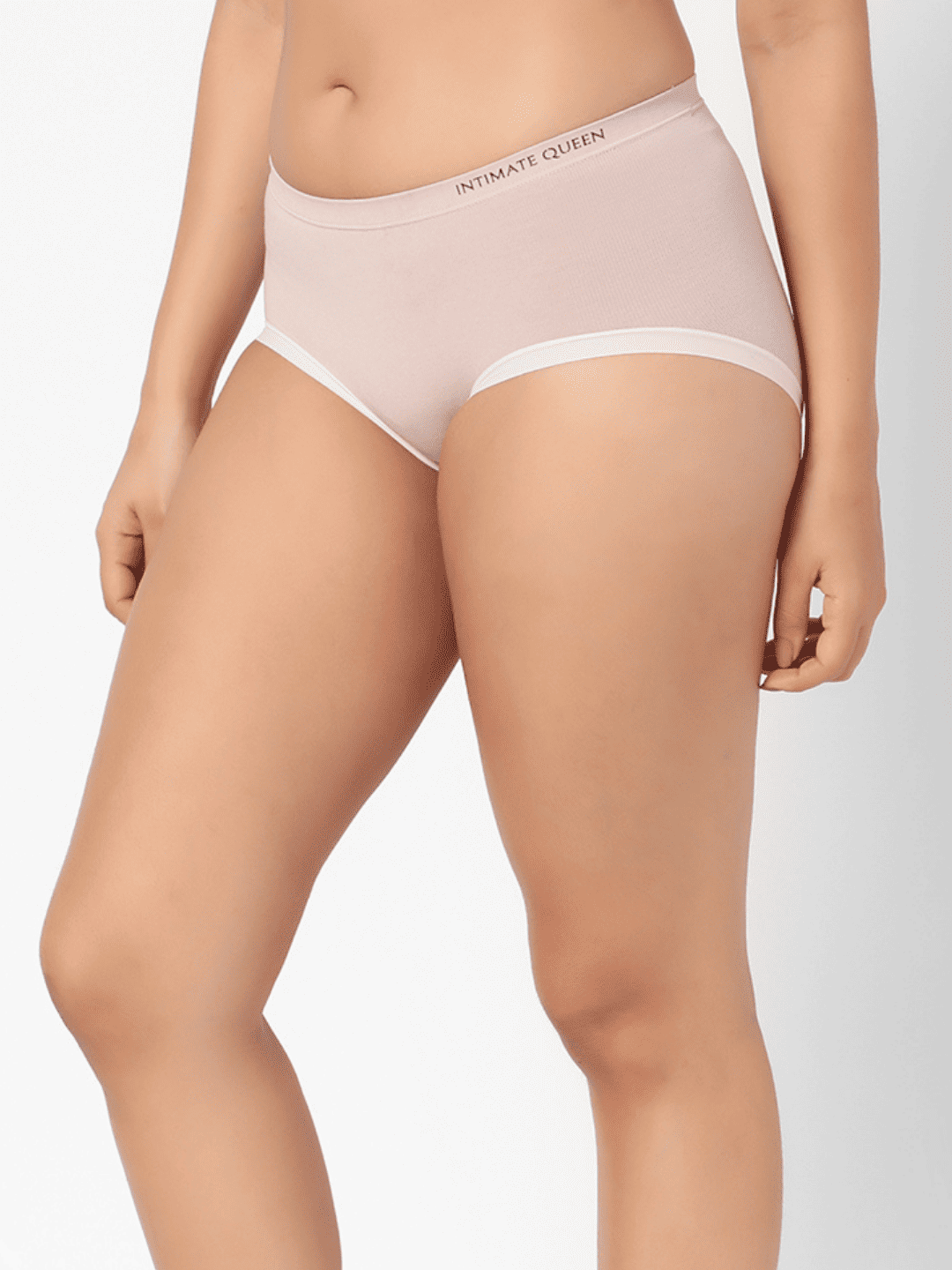 Pale lavender underwear worn by a person on a light gray background