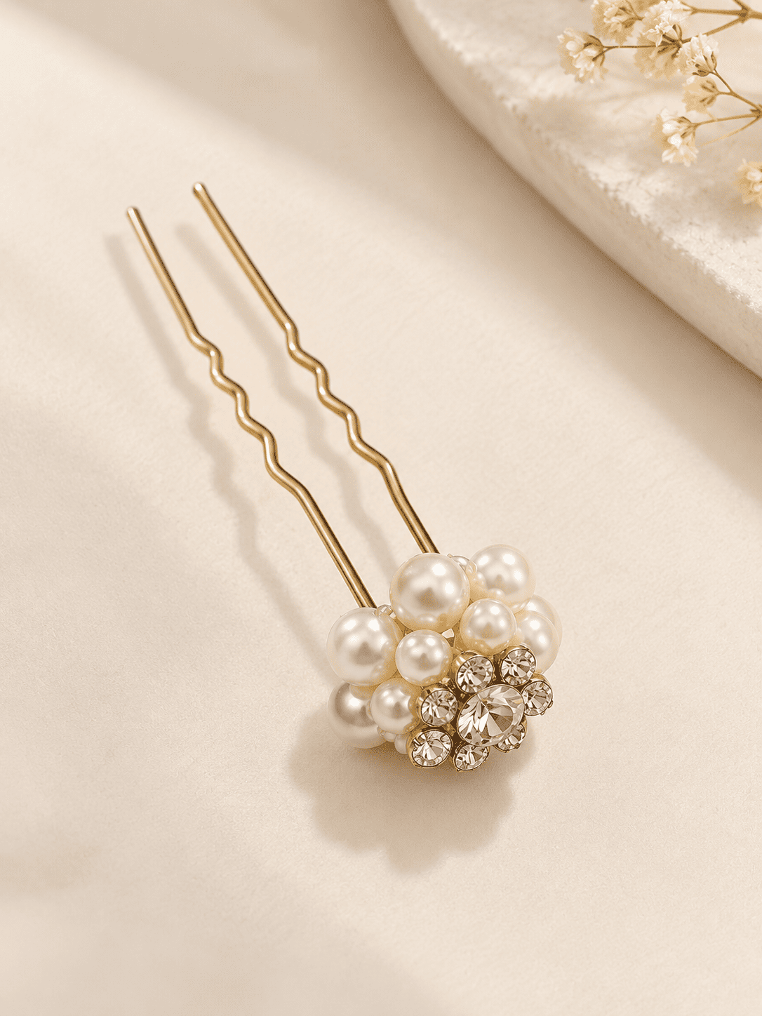Gold-tone U-shaped hair pin with white imitation pearls and clear crystal floral embellishments
