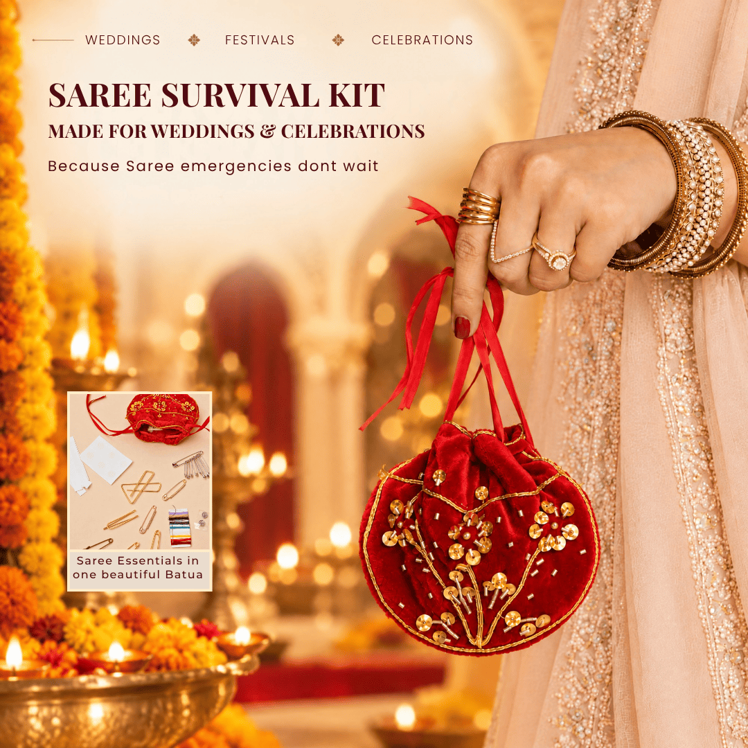 Woman in festive attire carrying a red handcrafted velvet Saree Survival Kit batua